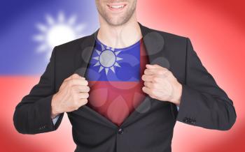 Businessman opening suit to reveal shirt with flag, Taiwan