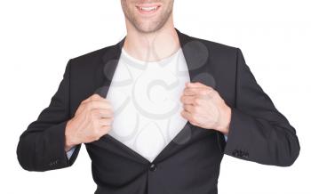 Businessman opening suit to reveal a white shirt, isolated on white