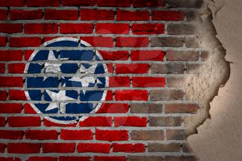 Dark brick wall texture with plaster - flag painted on wall - Tennessee