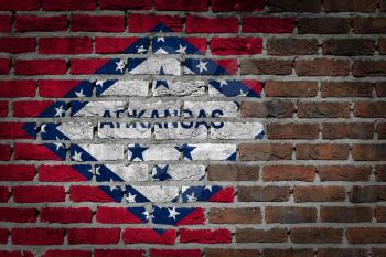 Dark brick wall texture - flag painted on wall - Arkansas