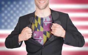 Businessman opening suit to reveal shirt with state flag (USA), Maryland