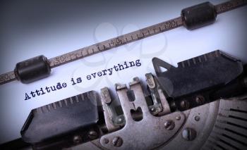 Vintage inscription made by old typewriter, Attitude is everything