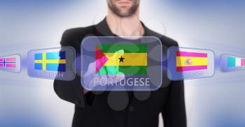 Hand pushing on a touch screen interface, choosing language or country, Sao Tome and Principe