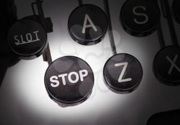 Typewriter with special buttons, stop