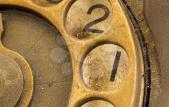 Close up of Vintage phone dial, dirty and scratched - 1, perspective