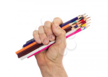 Used pencils in hand isolated on white background