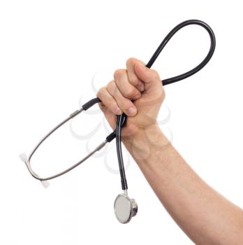 Close up image of a medical doctor with a stethoscope in his hands isolated on white background with copyspace