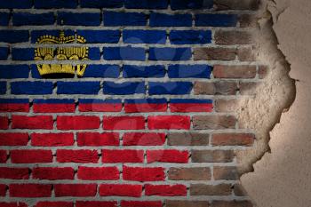 Dark brick wall texture with plaster - flag painted on wall - Liechtenstein