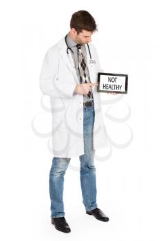 Doctor holding tablet, isolated on white - Not healthy