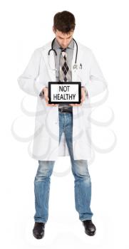 Doctor holding tablet, isolated on white - Not healthy