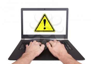 Man working on laptop, danger, isolated
