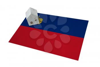 Small house on a flag - Living or migrating to Liechtenstein