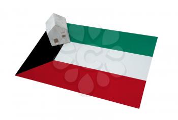 Small house on a flag - Living or migrating to Kuwait