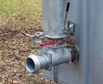 Close up water valve plumbing, industrial tap pipe