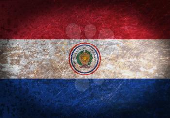 Old rusty metal sign with a flag - Paraguay