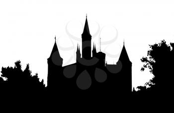 silhouette of a castle in the woods
