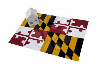 Small house on a flag - Living or migrating to Maryland