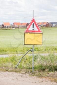 Red and white road traffic warning sign, the Netherlands