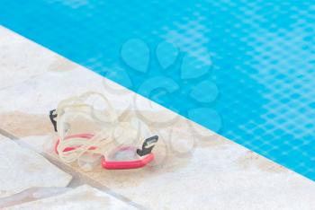 Snorkeling equipment at the side of the pool - Selective focus
