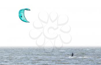 Kitesurfing on the waves of a dutch lake