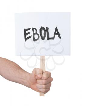 Hand holding sign, isolated on white - Ebola