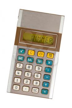 Old calculator showing a text on display - winner