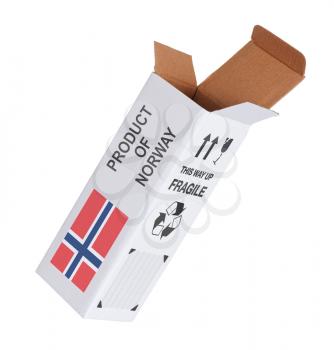 Concept of export, opened paper box - Product of Norway