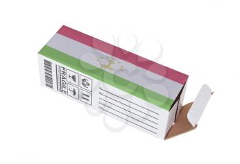 Concept of export, opened paper box - Product of Tajikistan