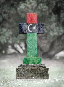 Old weathered gravestone in the cemetery - Libya