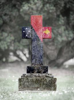 Old weathered gravestone in the cemetery - Papua New Guinea