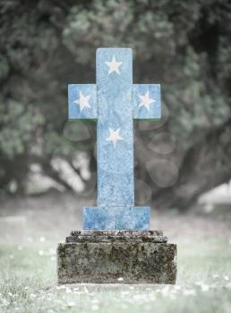 Old weathered gravestone in the cemetery - Micronesia