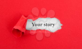 Text appearing behind torn red envelop - Your story