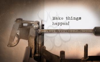 Vintage inscription made by old typewriter, make things happen