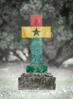 Old weathered gravestone in the cemetery - Ghana