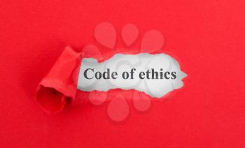 Text appearing behind torn red envelop - Code of ethics