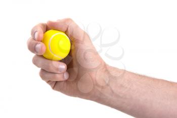 Small toy tennisball isolated on white background