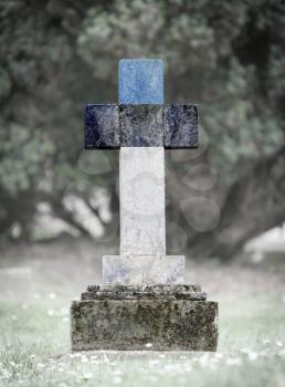 Old weathered gravestone in the cemetery - Estonia