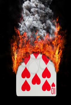 Playing card with fire and smoke, isolated on white - Ten of hearts