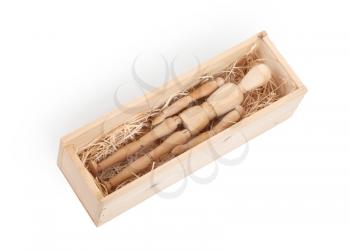 Wood figure mannequin in a wooden box - concept of death or retail