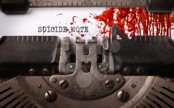Bloody note - Vintage inscription made by old typewriter, Suicide note