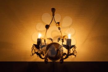 Vintage wall lamp isolated in the dark