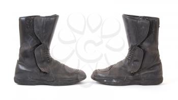 Old motorcycle boots, isolated on a white background