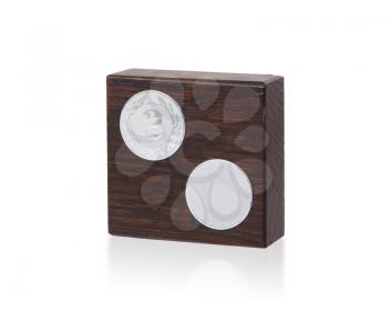 Isolated image of an od trophy made from wood, on white