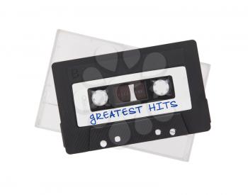 Vintage audio cassette tape, isolated on white background, Greatest hits