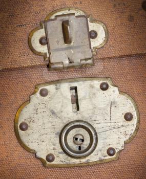 Old canvas trunk lock close up, vintage