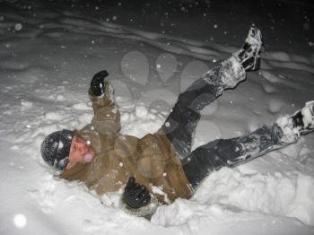 The image of the man falling on a snow