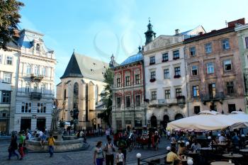 view to the square with monument of neptune in Lviv city