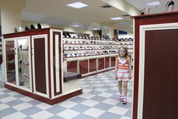 image of shoe shop with a lot of different shoes