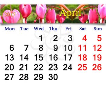 calendar for April of 2015 year with ribbon of blooming dicentra