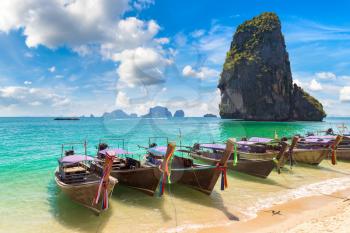 Traditional long tail boat on Ao Phra Nang Beach, Krabi, Thailand in a summer day